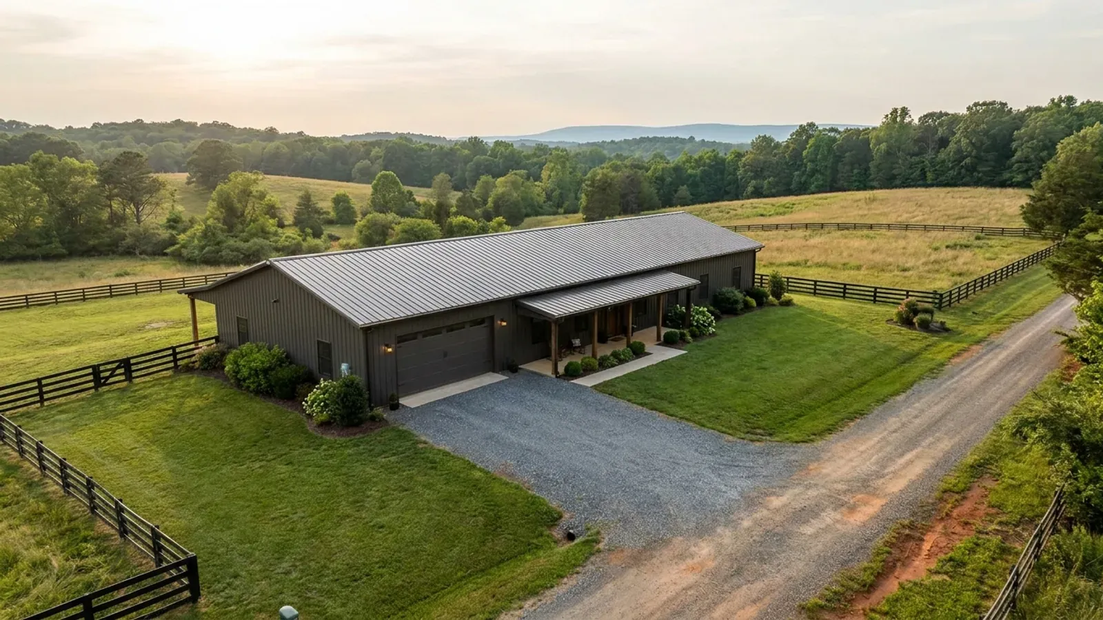 A completed single-story barndominium with a long, low roofline and no upper-level windows.